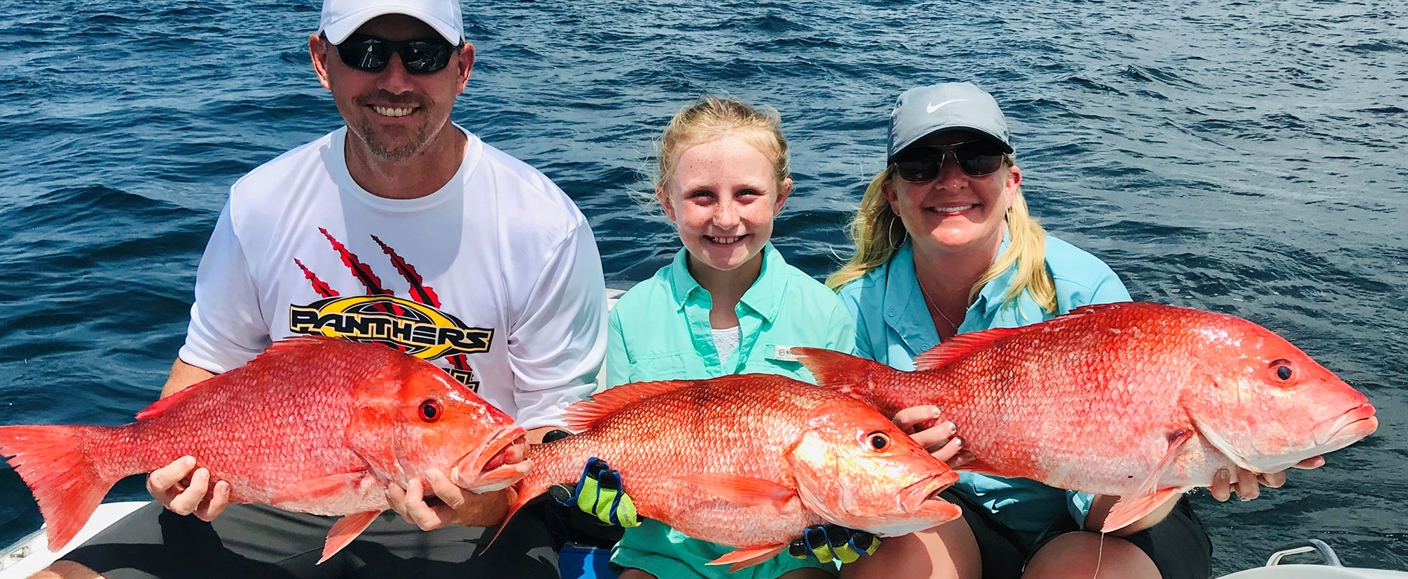 PCB Boat Adventure Tours - Family Fishing Together